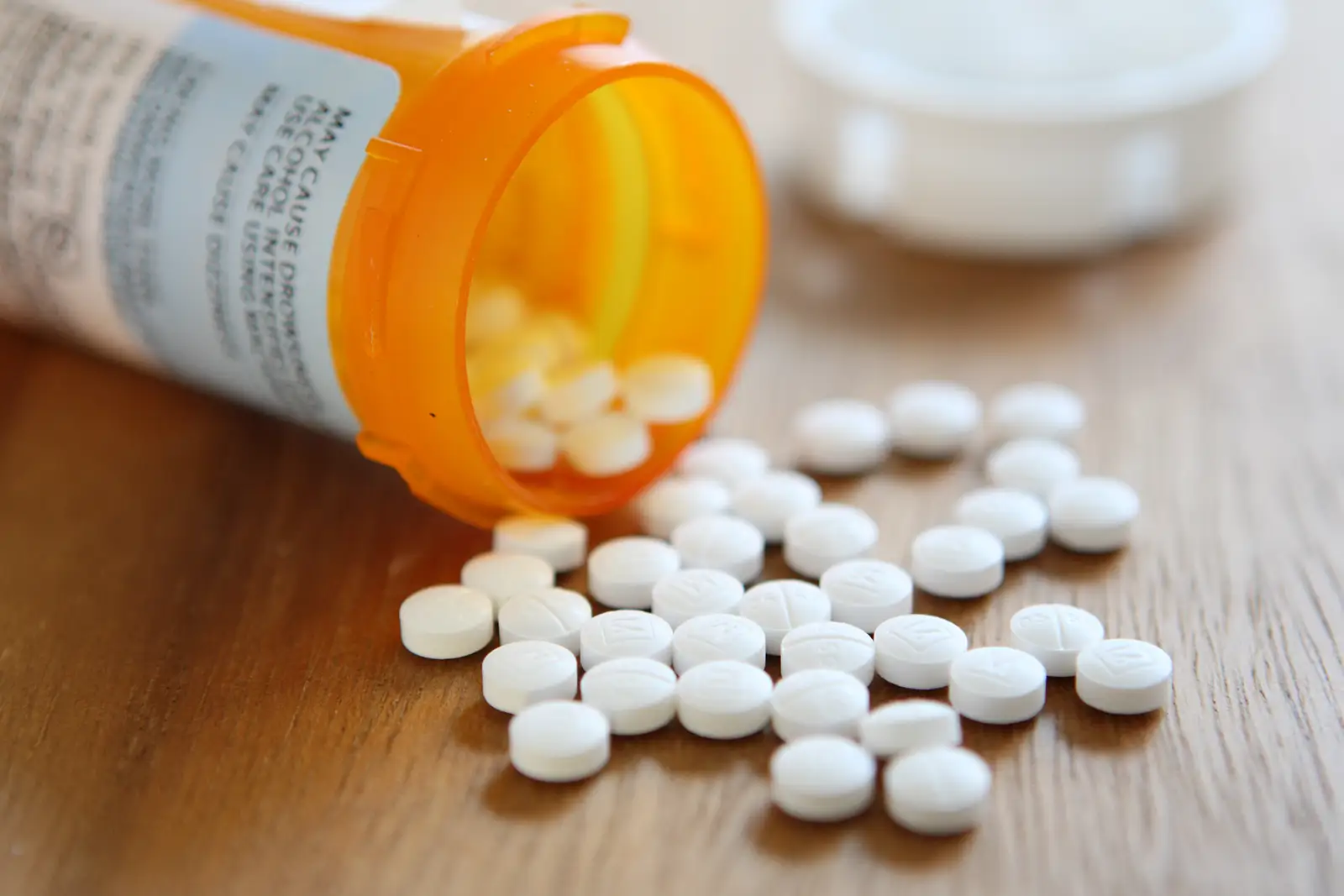 Prescription anxiety pill bottle on a counter.